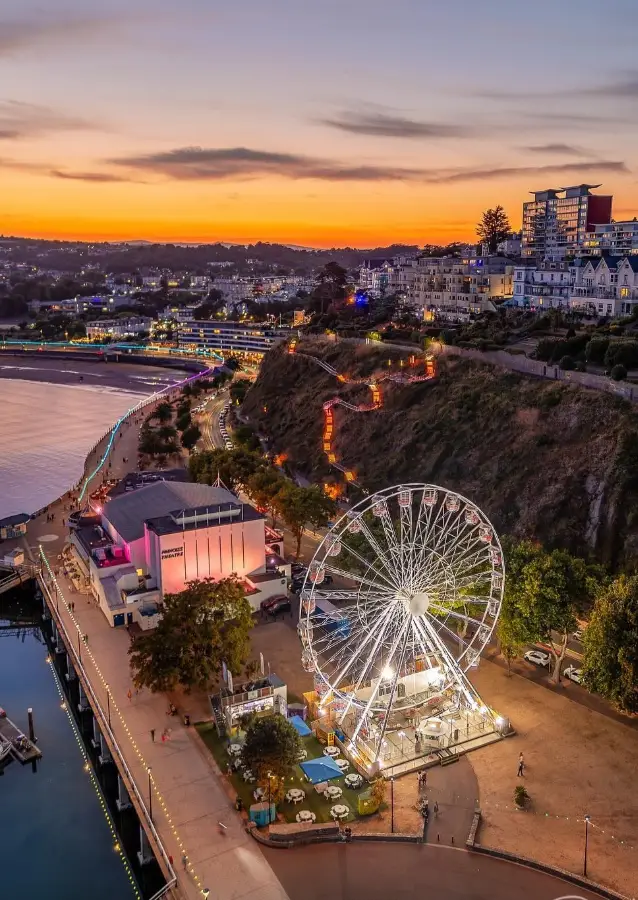 Torquay harbour and big wheel at sunset